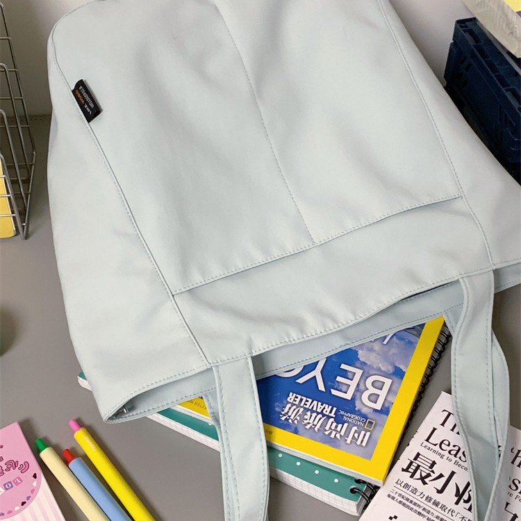 Japanese InS-style simple and casual commuter bag for women, 2024 new large-capacity tote bag, solid color single-shoulder bag for students Application Scenario