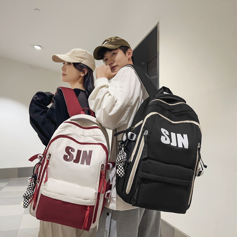 The 2024 new schoolbag for high school boys is a trendy, large-capacity, high-appearance-level backpack. It's a two-piece set for primary and secondary school students details Picture