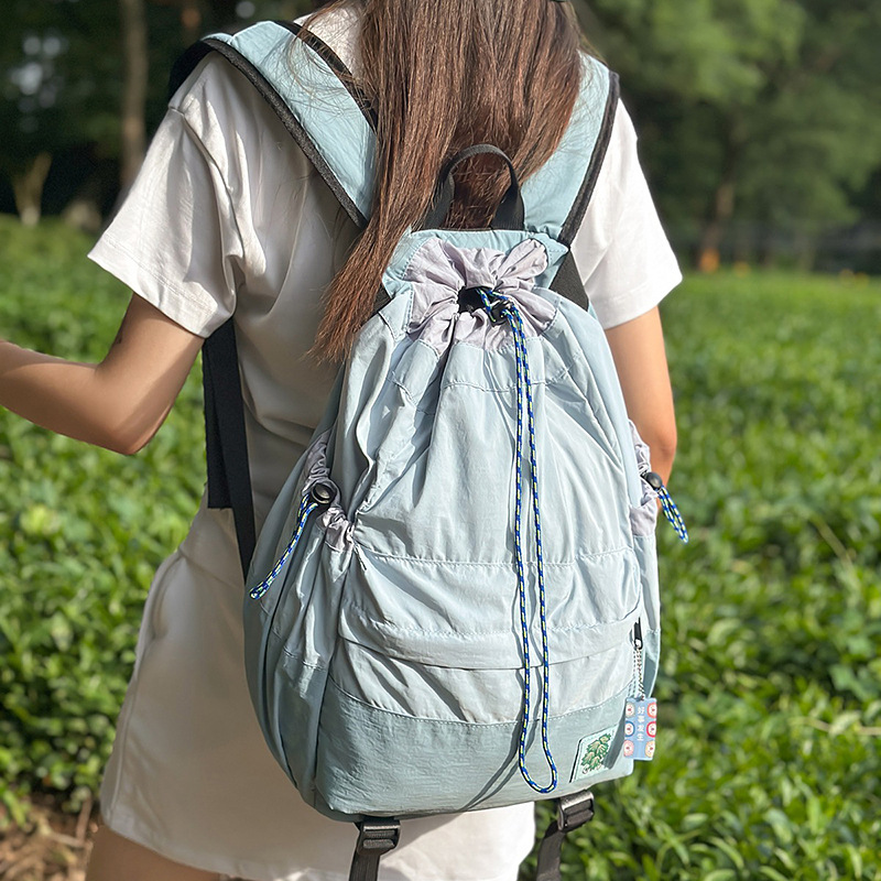 A new high-appeal, fresh and sweet, drawstring badminton bag from Forest-themed ins, a lightweight and large-capacity backpack for women details Picture