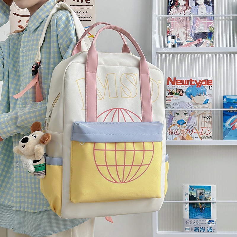 A new Japanese-style ins backpack with a high level of appearance, fresh and sweet, featuring color-blocking and large-capacity backpacks for junior and senior high school students full figure