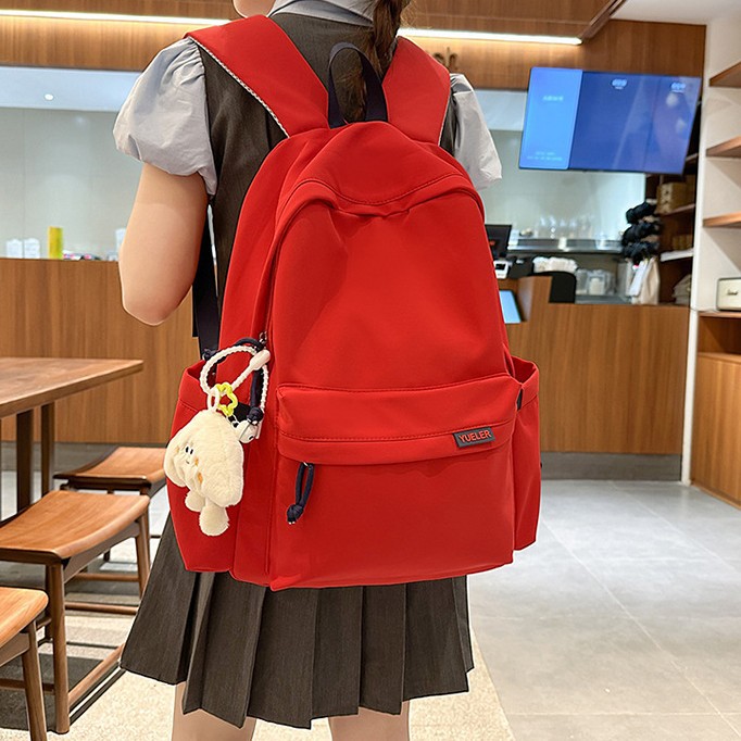 Japanese-style ins simple and versatile backpack, Korean-style school style solid color schoolbag for junior and senior high school students, lightweight and casual backpack full figure