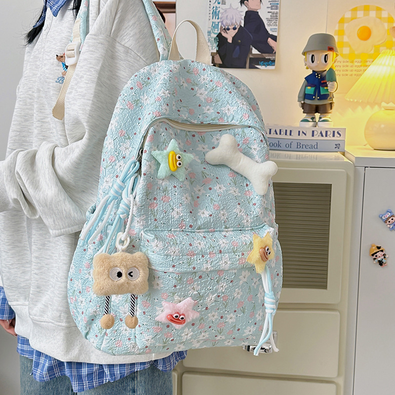 Korean InS-style floral print schoolbag for junior and senior high school students, high appearance level, large-capacity backpack, simple and lightweight campus backpack full figure