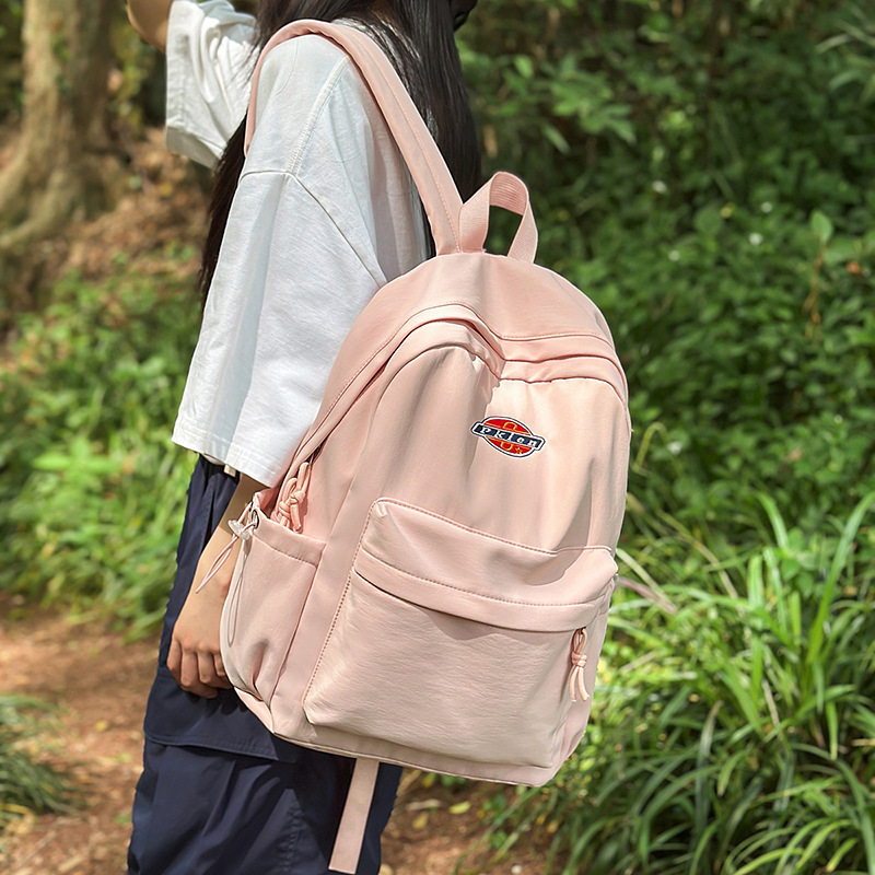 A new Japanese backpack with a high level of appearance. It is casual, simple and lightweight for middle and high school students, suitable for outdoor commuting, and has a large capacity for both shoulders details Picture
