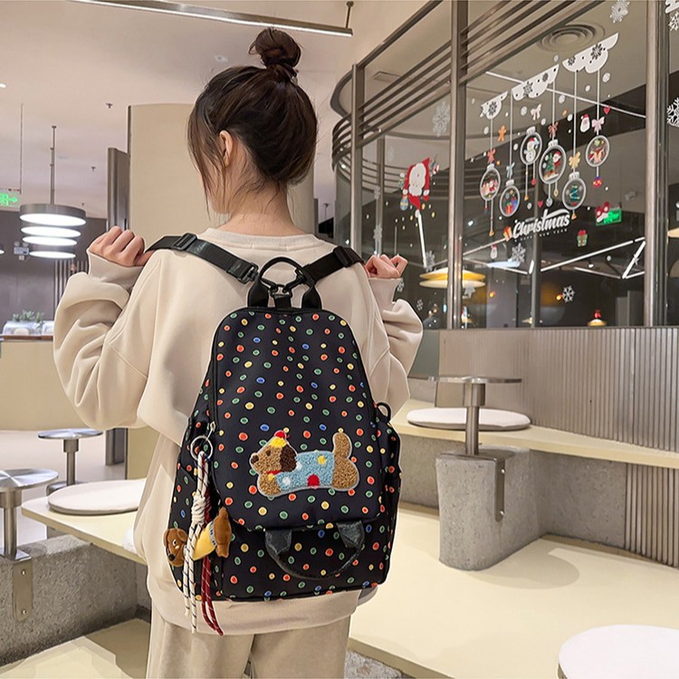 A cute Dachshund cartoon Japanese-style fresh and clean schoolbag, a multi-functional crossbody bag for junior high school students details Picture