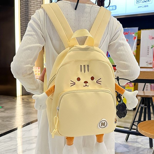 A new high-appeal, fresh, sweet and cute cartoon chicken backpack for primary school students in grades 3 to 6, with a large capacity full figure