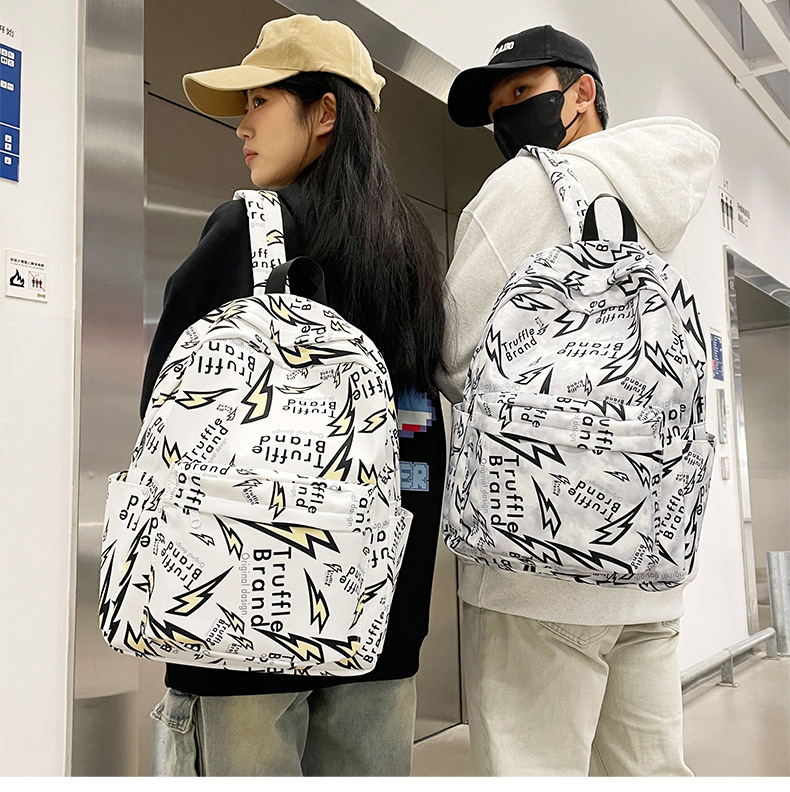 Korean version Haraju-style junior high school student graffiti backpack, large-capacity casual travel bag, gender-specific schoolbag details Picture