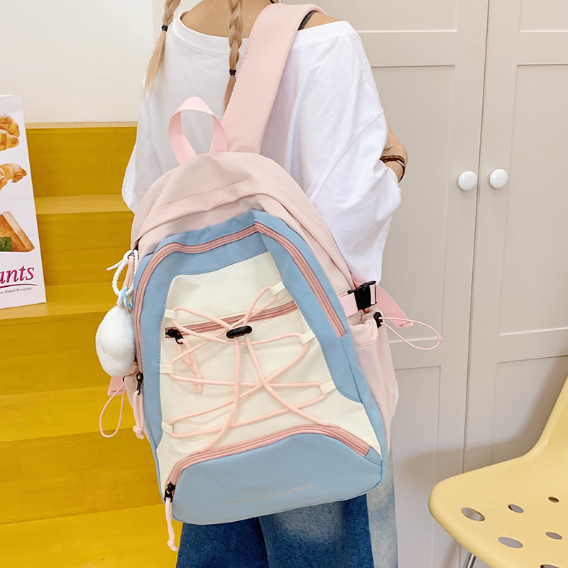 A drawstring color-blocking Haraju-style schoolbag with a unique design sense for girls, a versatile backpack for commuting, and a lightweight backpack for junior and senior high school students details Picture