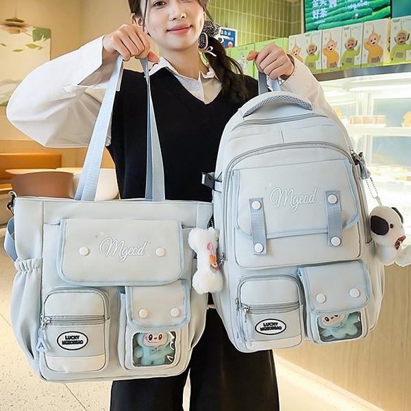 The new schoolbag features a high level of appearance, a college-style high school backpack, and a Korean-style Instagram sweet girl two-piece backpack for primary school students full figure