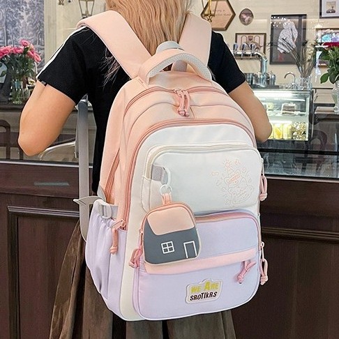 A new high-appearance-level Korean ins fresh and sweet backpack for junior and senior high school students, featuring color-blocking and large-capacity backpacks full figure