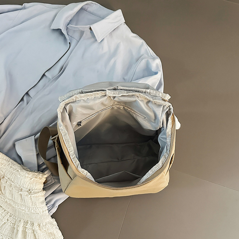 A new Japanese-style ins bucket backpack with a high aesthetic level, fresh and sweet solid color, and a simple travel backpack for middle and high school students Application Scenario
