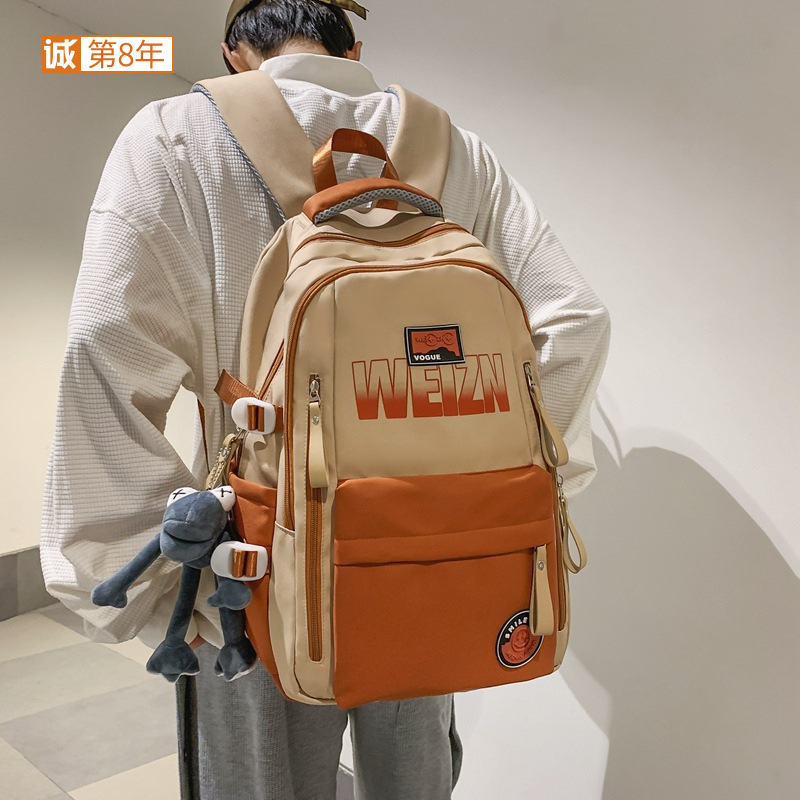 New American retro college student trend couple backpacks, large-capacity casual backpacks for junior and senior high school students full figure