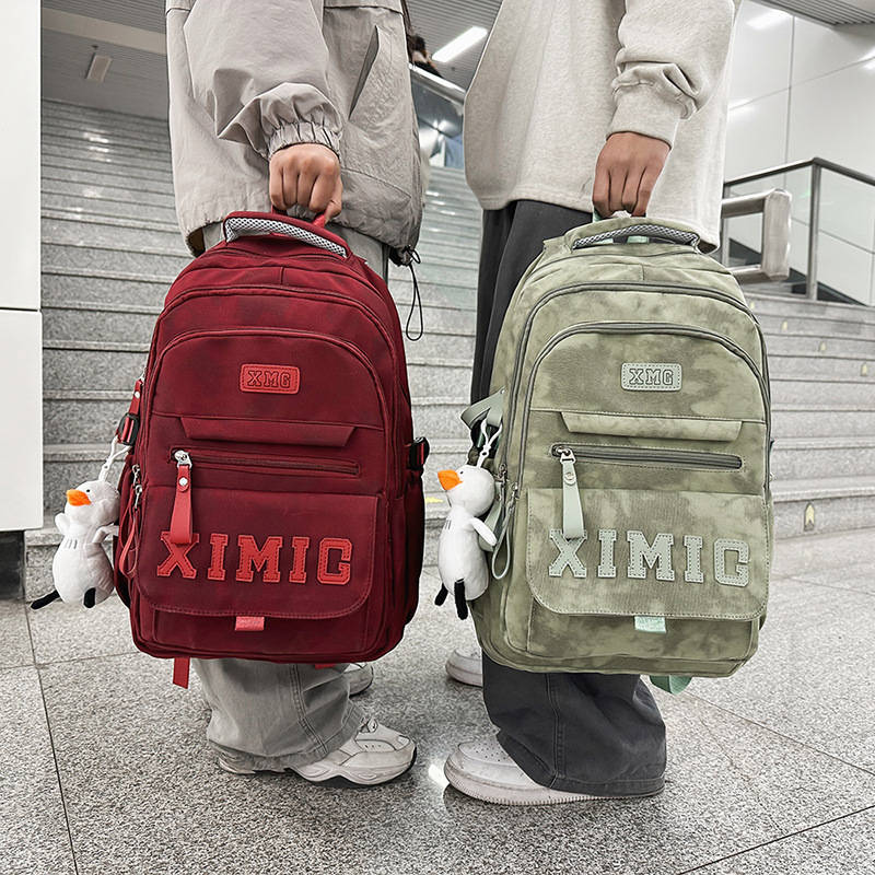 The new men's large-capacity, trendy and cool couple's casual travel backpack is sturdy and durable. It is a backpack for teenagers and students details Picture