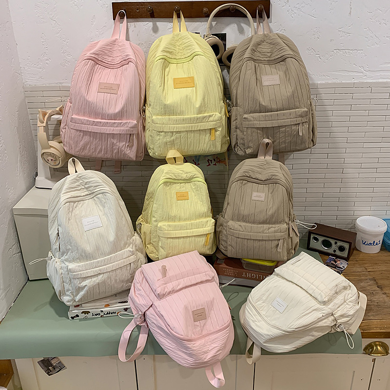 Solid-color cream large-capacity schoolbag, versatile student ins lightweight student backpack, forest-style girl travel backpack details Picture