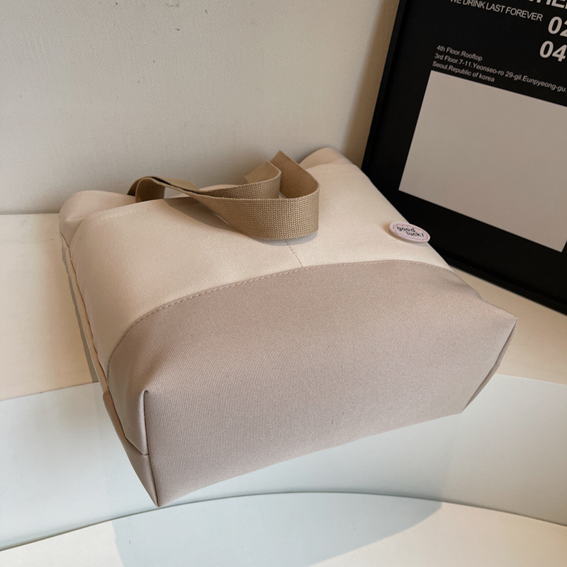 Casual commuting bag, women's large-capacity bag, 2025 new style fashionable hand-held shoulder canvas bag, work tote bag Specification drawing