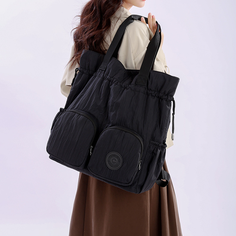 2025 New large-capacity casual backpack with drawstring, a lightweight backpack for commuting and traveling, and a single-shoulder bag for college students attending classes details Picture