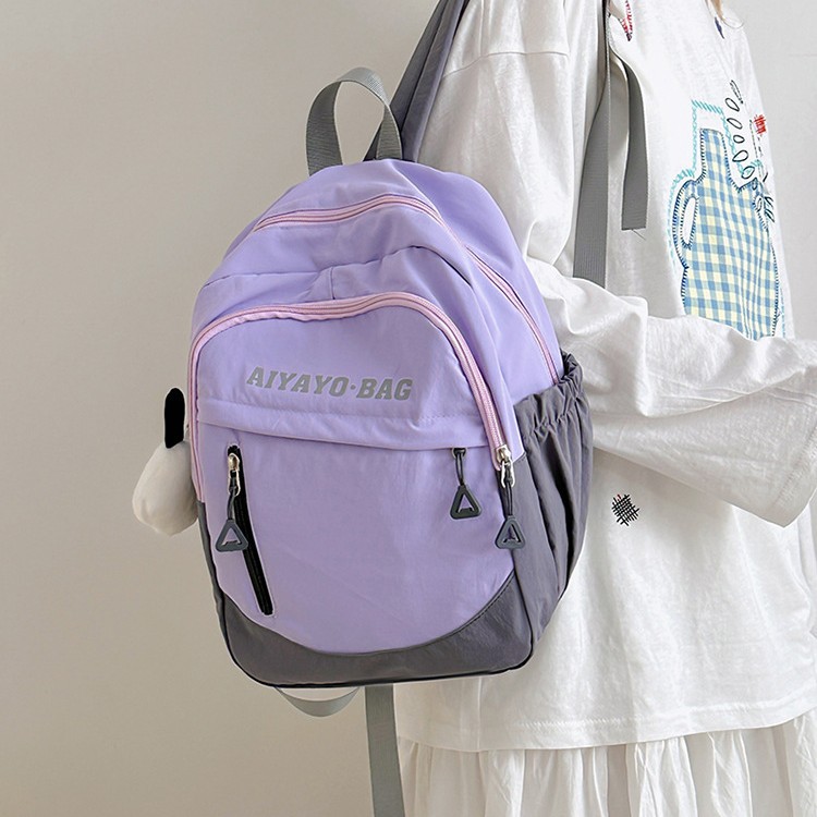 A new high-appearance-level letter-style backpack for junior and senior high school students, which is casual, simple, lightweight, versatile for commuting and has a large capacity full figure