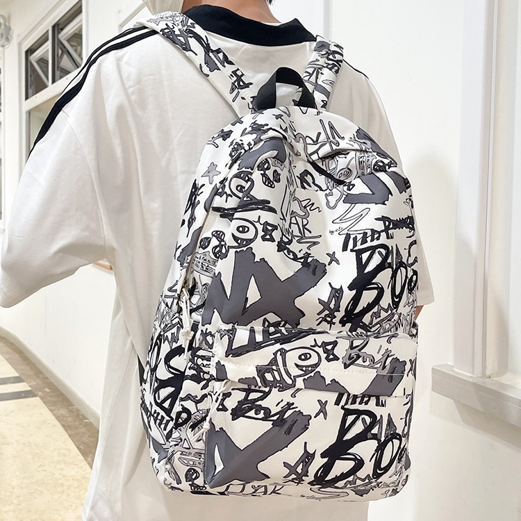 A new Korean-style Instagram backpack with a high level of appearance, trendy and cool personality, and graffiti. It is a lightweight and large-capacity backpack for junior and senior high school students details Picture