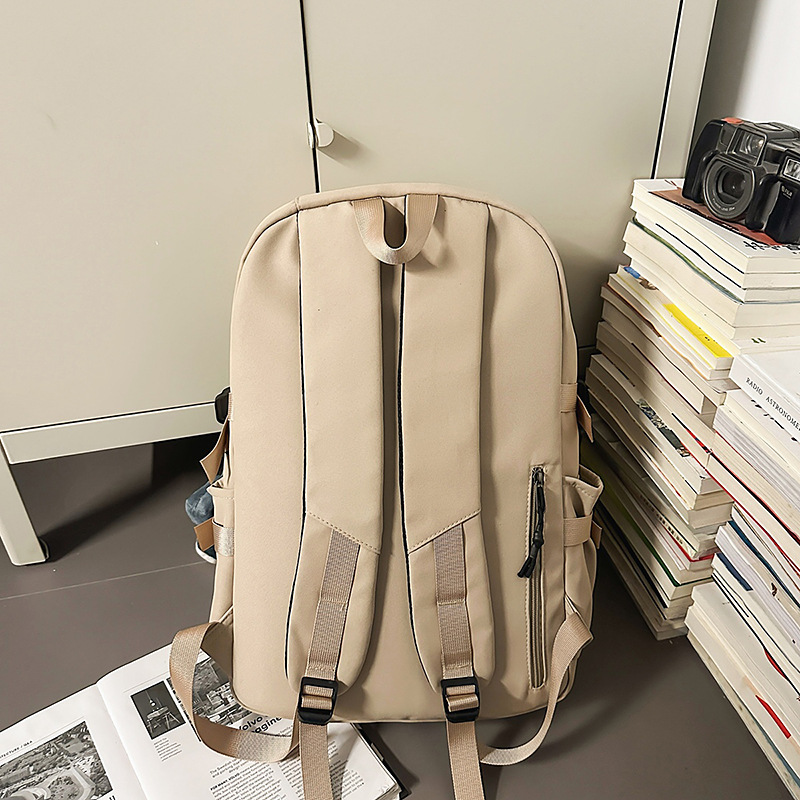 A new high-appeal, niche design backpack from Korean Instagram. It's a simple, lightweight, and large-capacity backpack in a solid color for couples Specification drawing
