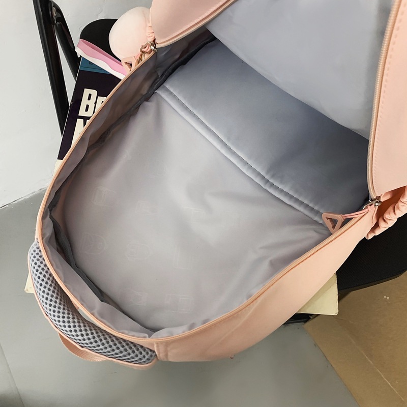 New large-capacity schoolbag in the style of a girl's school, a Korean version of a backpack for junior and senior high school students, and a simple college student schoolbag Application Scenario