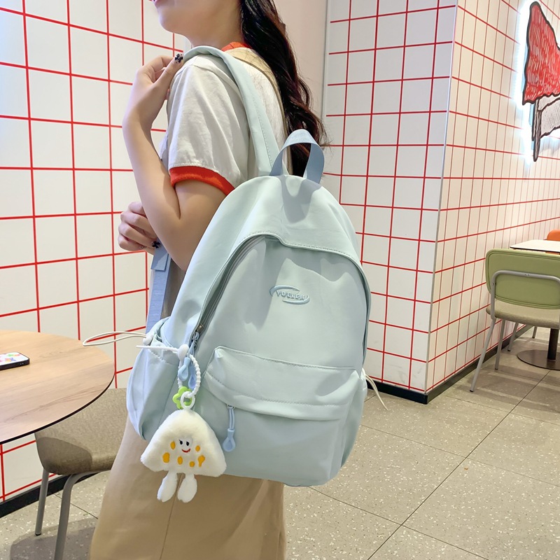 A fresh and artistic girl's backpack for junior and senior high school students in solid color, lightweight and versatile, large-capacity backpack details Picture