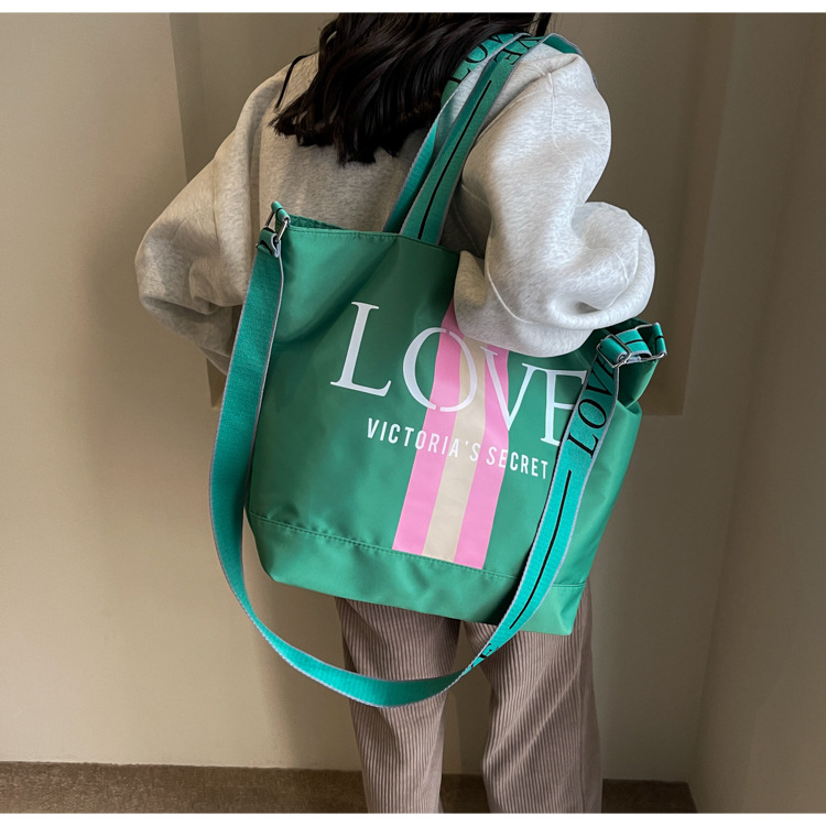 2025 New canvas bag, large-capacity hand-held tote bag, simple, casual and versatile shoulder bag, fashionable yoga bag details Picture