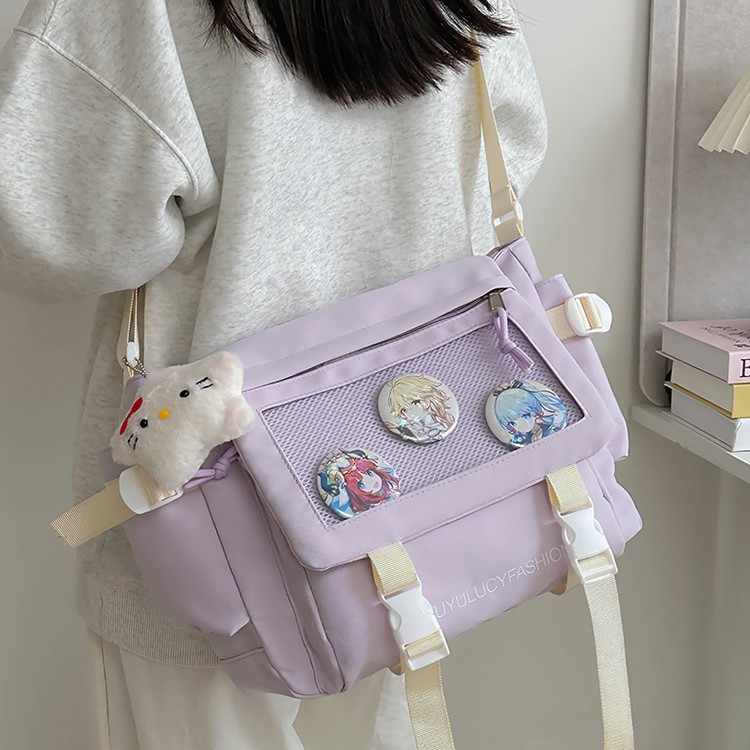 The college wind pain bag is versatile, simple, and has a large capacity. It is a class messenger bag for students and a transparent, slappy, single-shoulder, casual, and crossbody bag details Picture