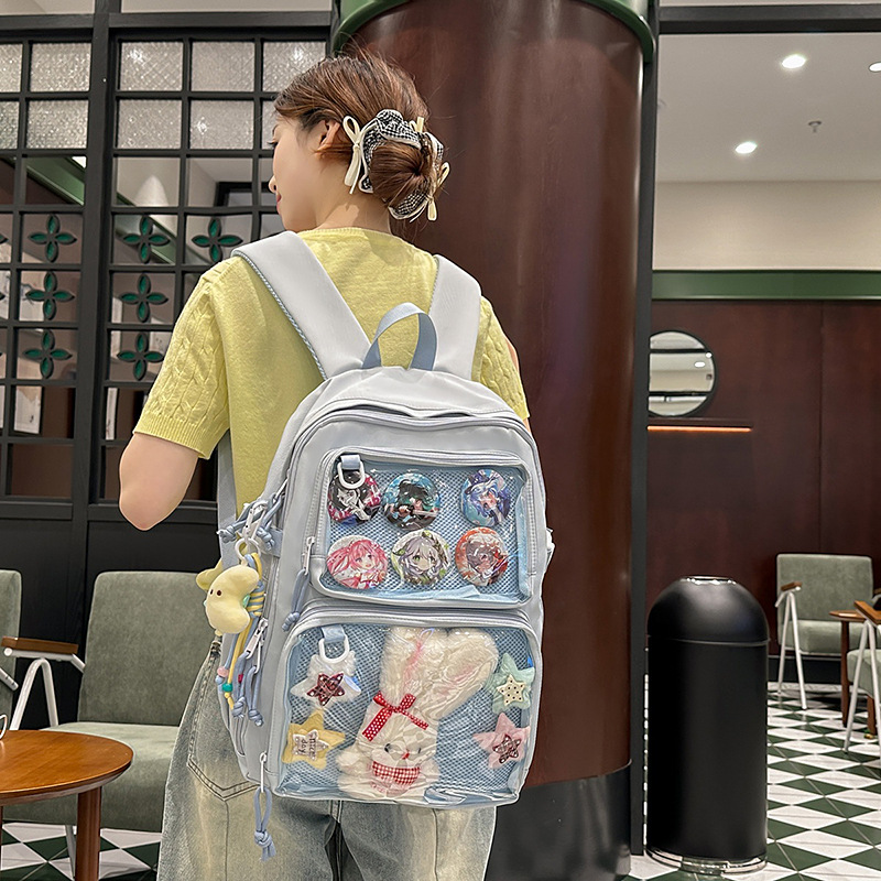 A new Japanese-style 2D anime show pain bag for students, a large-capacity casual schoolbag, a lightweight, sweet and versatile backpack full figure