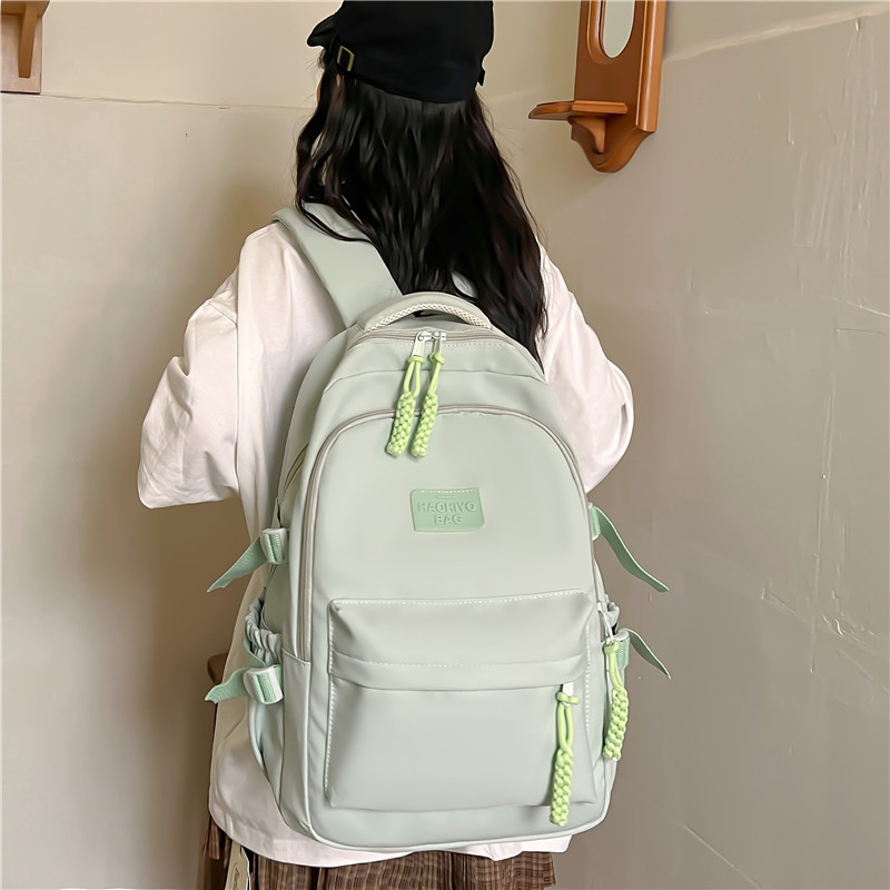 Girls' forest-style, fresh and light middle school backpack, large-capacity, lightweight Korean version, casual backpack for primary school students details Picture