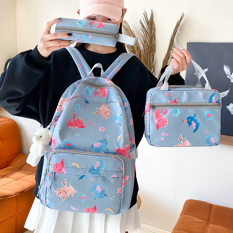 A cute cartoon printed backpack with high appearance level, a fresh and clean schoolbag, and a three-piece set of insulated bento backpacks for girls in junior and senior high school Specification drawing