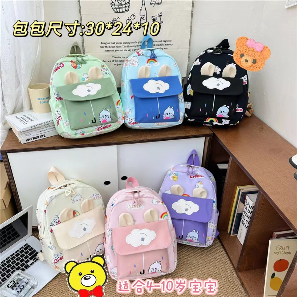 The 2023 new autumn collection features a student backpack with a new high level of appearance, fully printed with cute rabbit ears and a double-shoulder bag full figure