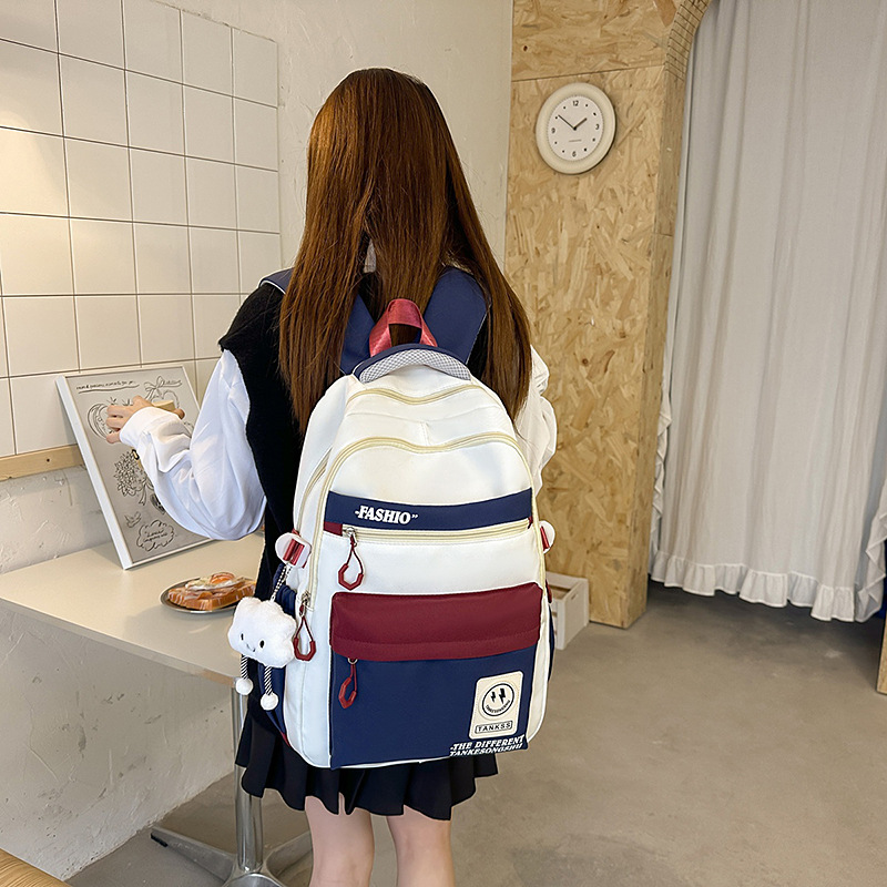 Korean InS-style smiling face backpack, a versatile schoolbag for junior and senior high school students, casual, simple and large-capacity backpack full figure