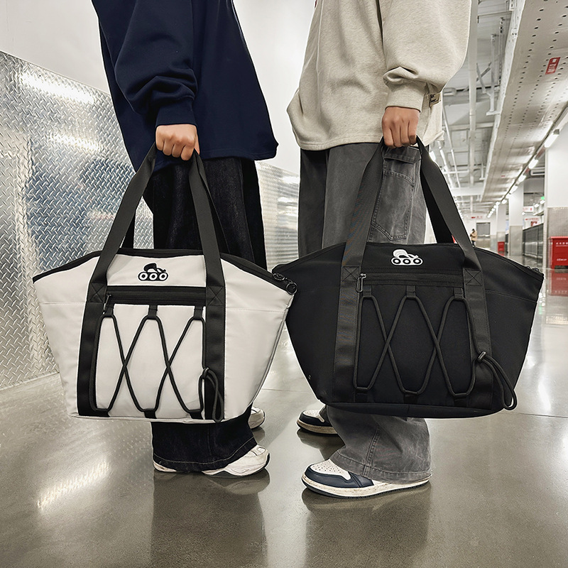 The 2025 new large-capacity tote bag is a fashionable and versatile single-shoulder bag, a sporty crossbody bag, a couple's lightweight bag with a high level of appearance details Picture