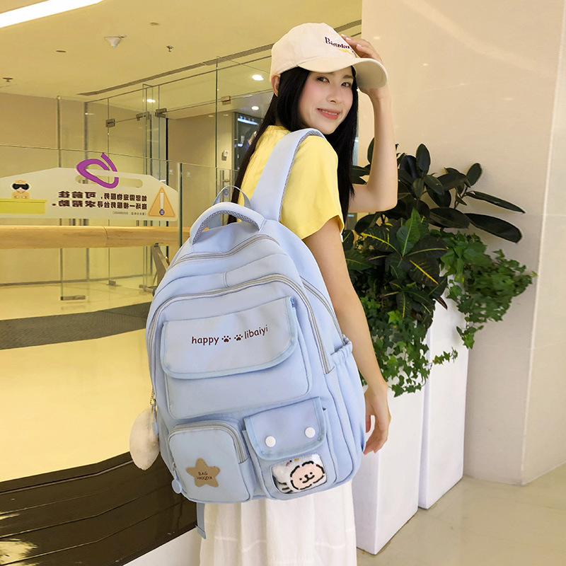 Wholesale of pure color backpacks for female junior high school students with a fresh and simple Korean school style and multi-layered design details Picture