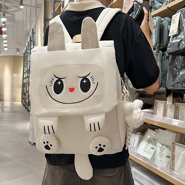 A new high-appeal, fresh, sweet and cute cartoon backpack for junior and senior high school students, with a large capacity for light travel full figure