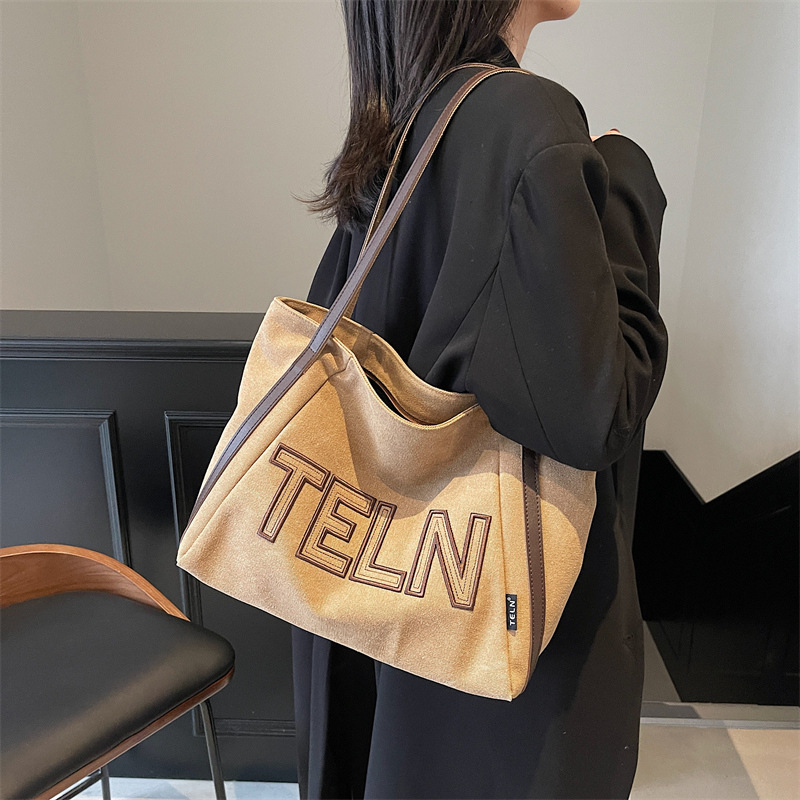 Large-capacity canvas tote bag for women, 2025 new style casual single-shoulder bag, large bag for school commuting, and handbag for going out full figure