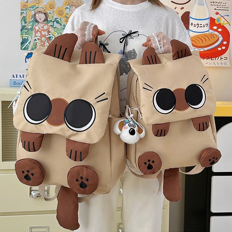 New high-appeartion-level cute cartoon backpack, light backpack for primary school students, ugly and cute cat, girlish mini backpack full figure