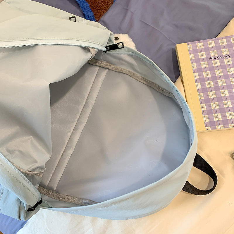Japanese-style simple solid-color backpack, lightweight for commuting, large-capacity student schoolbag, casual and versatile, outdoor travel backpack Application Scenario