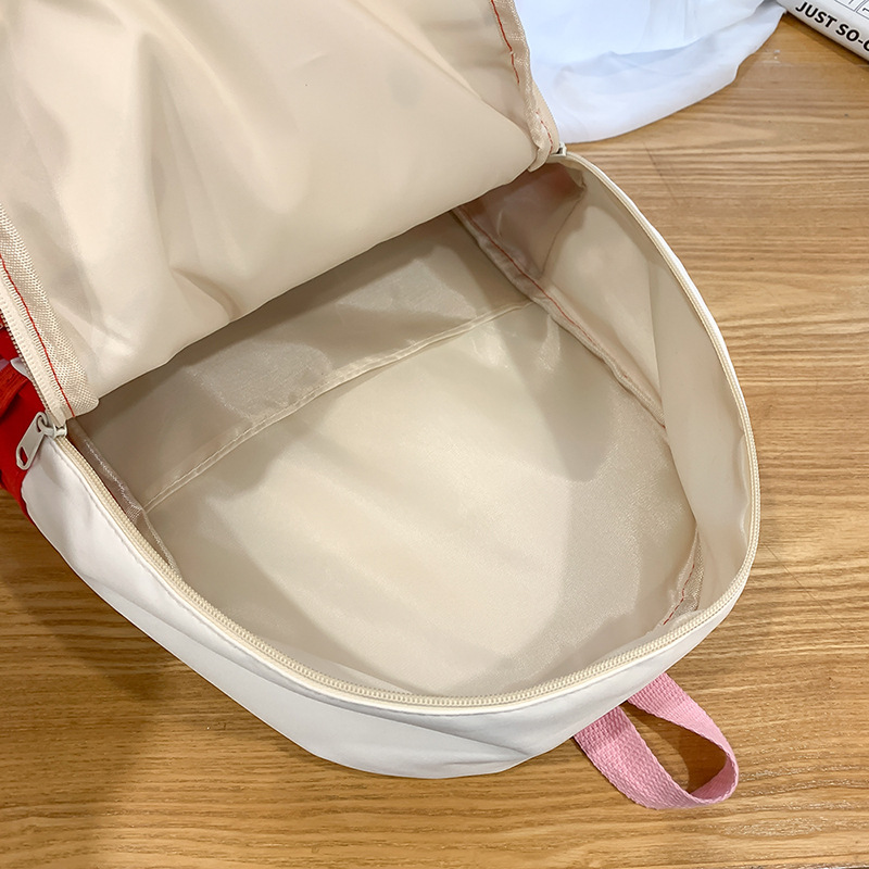 Sweet bow milk tea-colored backpack, large capacity, versatile, cute cartoon schoolbag, Japanese-style casual and lightweight backpack Application Scenario