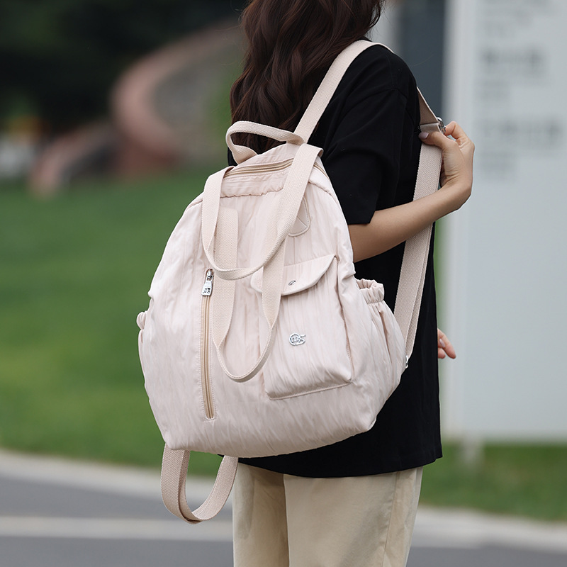 A new Korean-style Instagram backpack with a high aesthetic level, featuring a casual, simple and lightweight design for couples and a large capacity for travel full figure