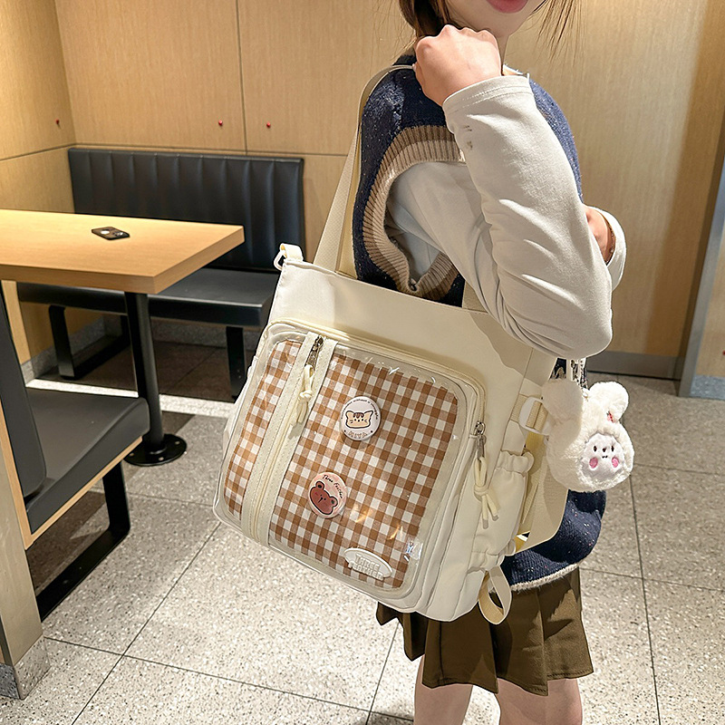 A cute Japanese girl with a small appetite, a transparent pain-relieving bag, a large-capacity single-shoulder bag for students in class, and a crossbody bag details Picture