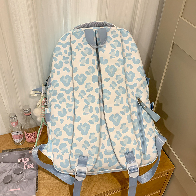A new Japanese ins Harajuku style cow leopard print backpack, a lightweight and large-capacity backpack for junior and senior high school students to take remedial classes Specification drawing