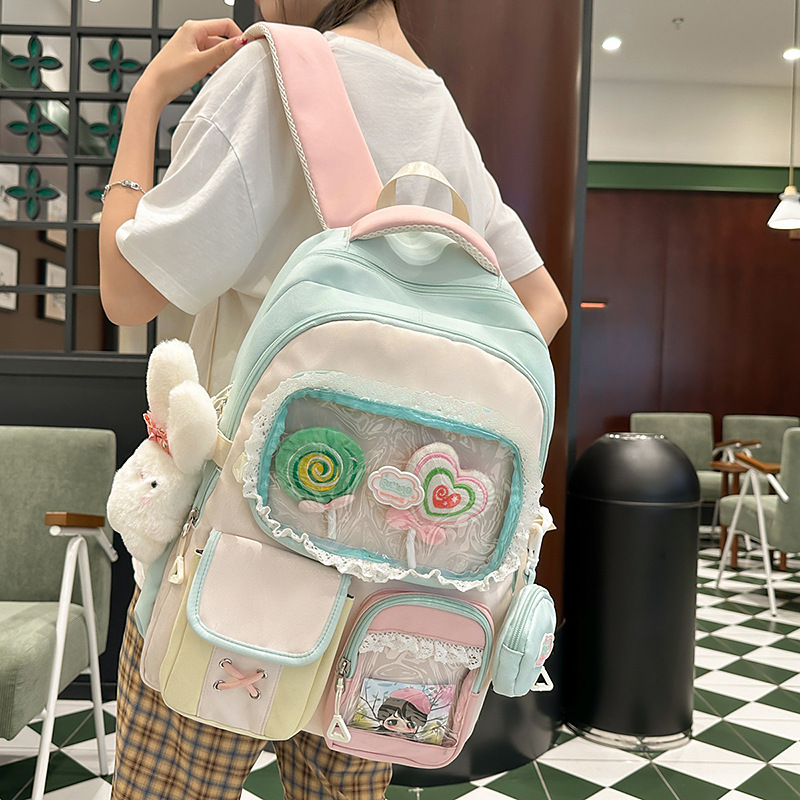 A new Japanese-style high-appearance-level ins pain bag for junior and senior high school students, featuring cute color-blocking and large-capacity backpacks details Picture