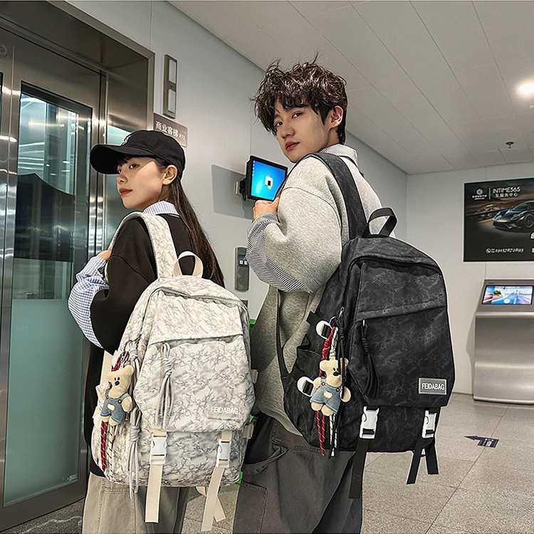 The 2025 new backpack is a lightweight, casual and simple outdoor travel bag. It has a large capacity and is versatile for junior and senior high school students full figure