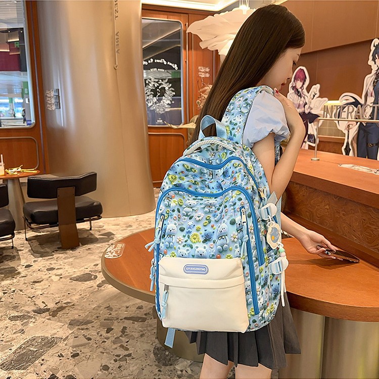 A new high-appearant-level fashionable cartoon 3D bear graffiti backpack for female students, a large-capacity backpack for casual commuting full figure