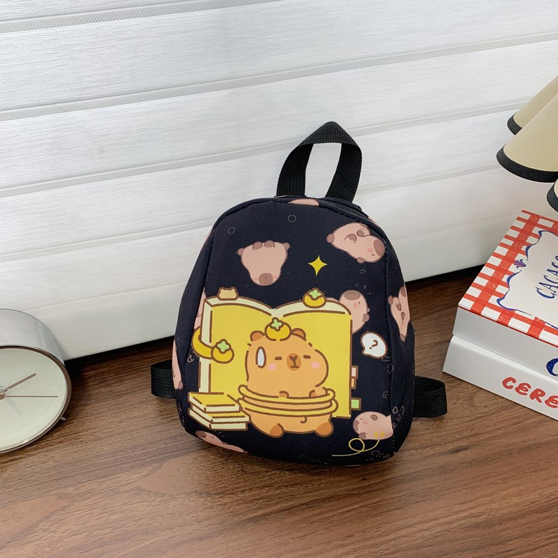 The 2025 summer new children's bag is cartoonish, cute and stylish with printed patterns. It's a pocket bag for boys and girls and an outdoor casual backpack details Picture