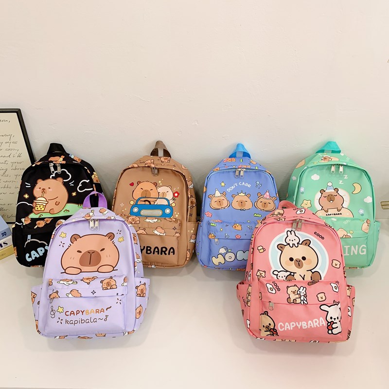 Trendy and artistic backpack for junior high school and primary school students, large-capacity pressure-reducing backpack, cute printed series of student bags full figure