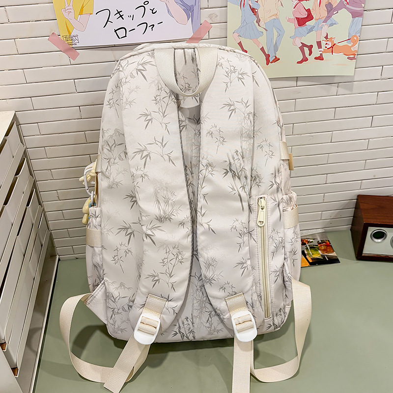 A new high-appeal Korean-style ins solid color simple leaf print backpack for couples, a lightweight and large-capacity backpack Specification drawing