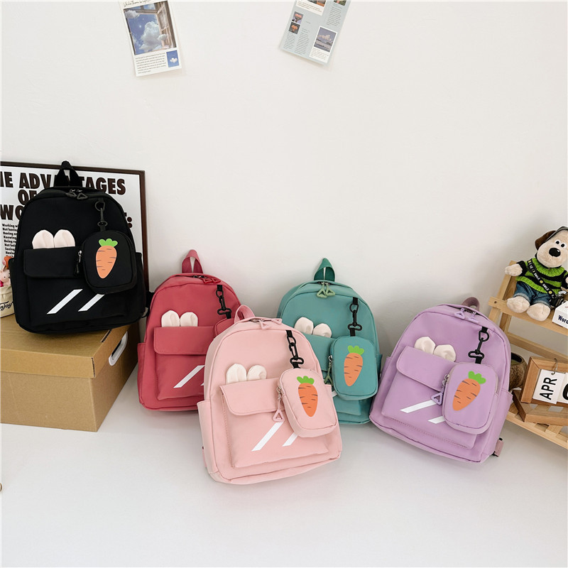 Kids' stylish little backpack 2024 New Korean version with trendy carrot print, cute and unique kindergarten bag for kids full figure