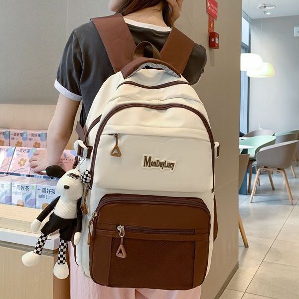 High-appearance-level Japanese-style schoolbag with contrasting colors, lightweight backpack for junior and senior high school students, 2023 new large-capacity couple backpack full figure