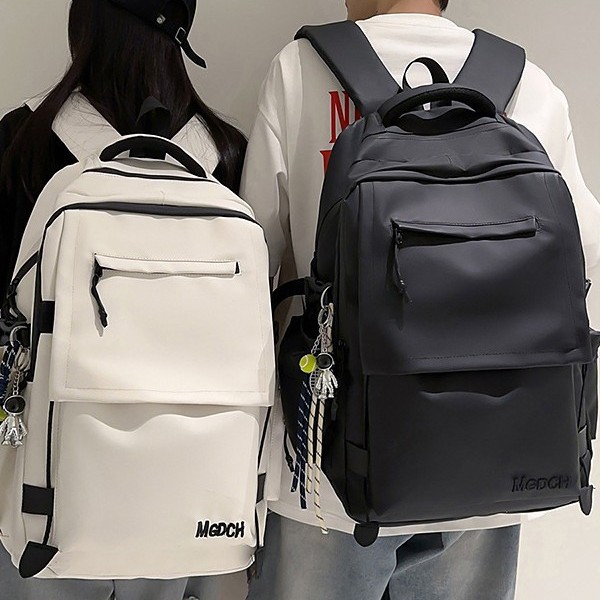 A new high-appearancelevel solid-color simple backpack from Korean Instagram, a couple's lightweight travel and mountaineering backpack with large capacity full figure